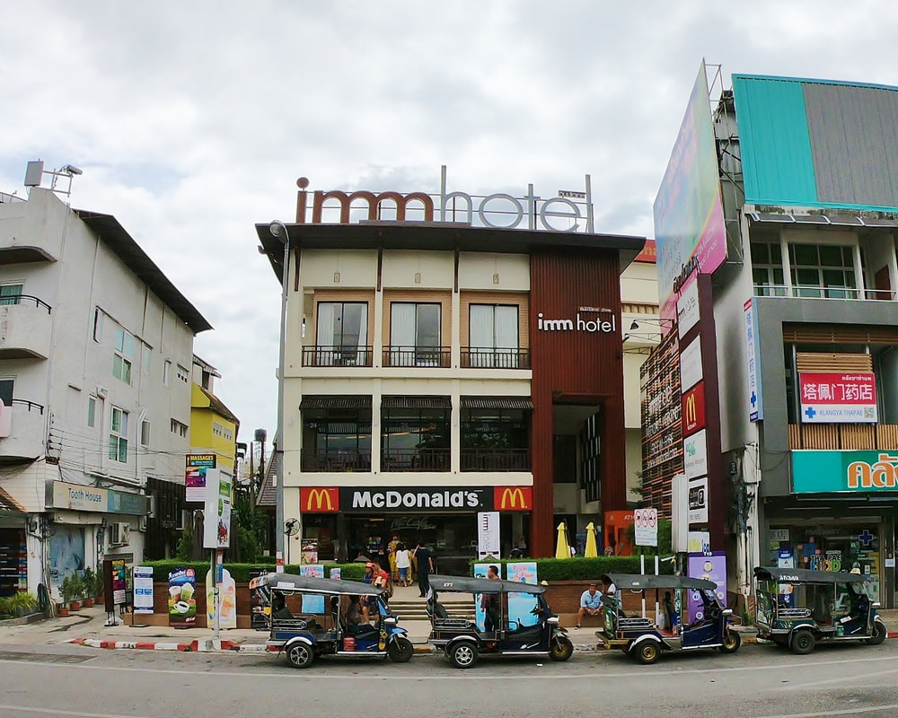 Imm Hotel and Mc Donalds at Tha Phae Gate Chiang Mai, Thailand.  塔佩门